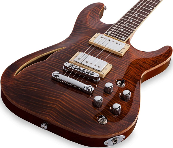 Электрогитара SCHECTER [C-1 E/A CAT'S EYE] электрогитара 6-струнная с пьезо датчиком в бридже, корпус: красное дерево, топ: зебрано, гриф: красное дерево, накладка: черное дерево, 24 лада, цвет: Cat's Eye