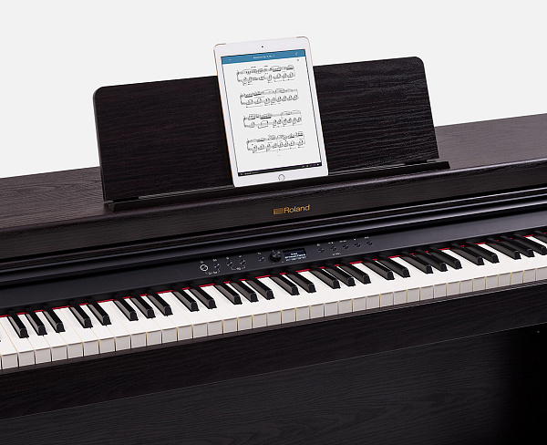 Цифровое пианино ROLAND [RP701-DR] корпусное, клавиатура PHA-4, покртиые клавиш под слоновую кость,  324 тембра, полифония - 256 голосов, функция обучения, 3 педали, 2 выхода на наушники,цвет Dark Rosewood.